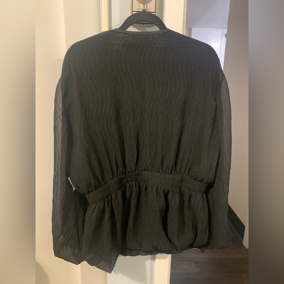 Black blouse or easily a light jacket. - Picture 2 of 2